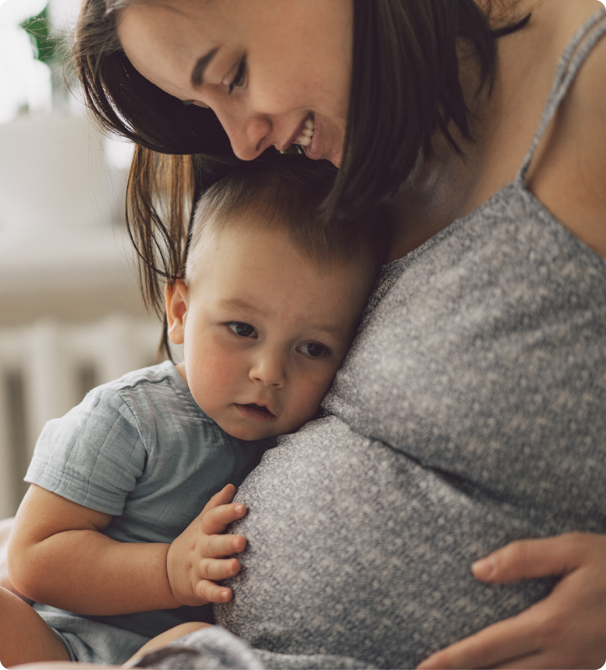 EPH Image: Baby sitting with Pregnant mom